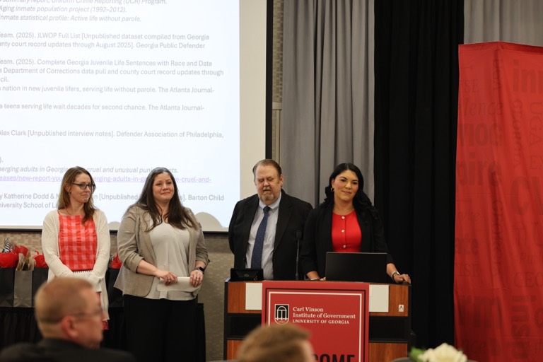 A Leadership Academy team presents its capstone project at graduation